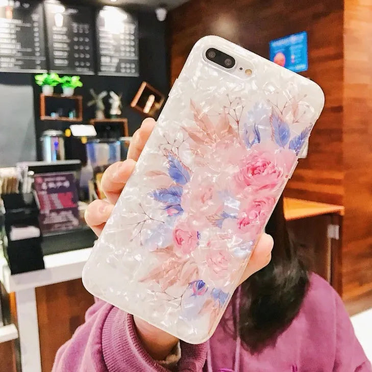 Dream Shell soft TPU iPhone case shown in brown, purple and white colours for multiple iPhone models.