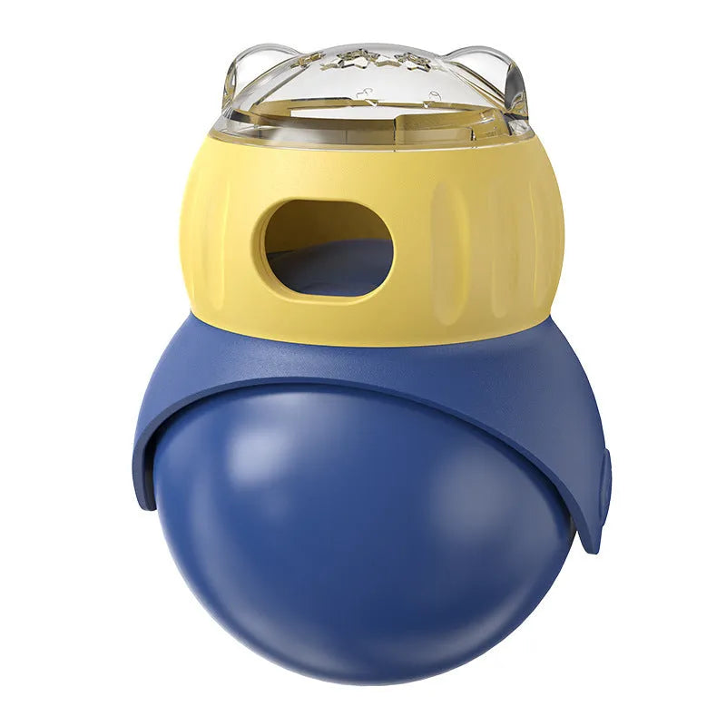 Morandi yellow and blue owl-shaped plastic puzzle feeder for cats on a wooden floor.