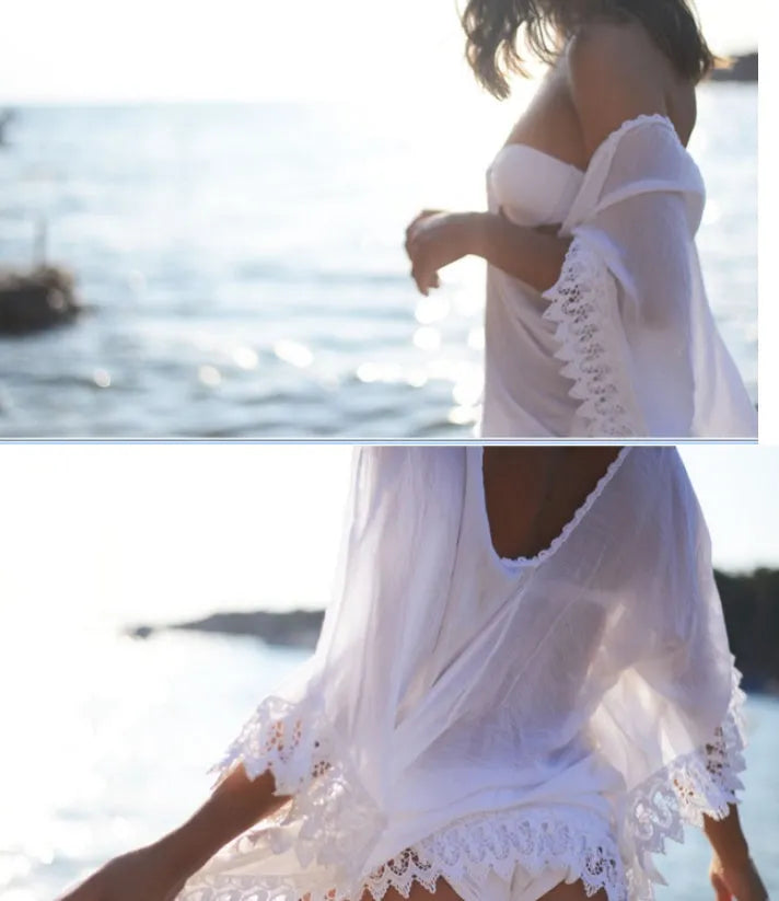 White tasselled beach coverup with pom-pom trim, lightweight kaftan style for beach and poolside