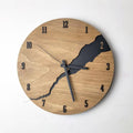 Modern wooden wall clock with a crack design on a clear acrylic face, 25 cm in diameter.