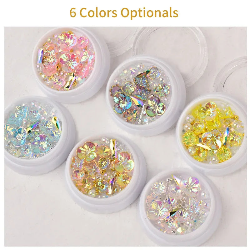Jar of nail sequins with flower and butterfly shapes in 6 colours, 15g net content