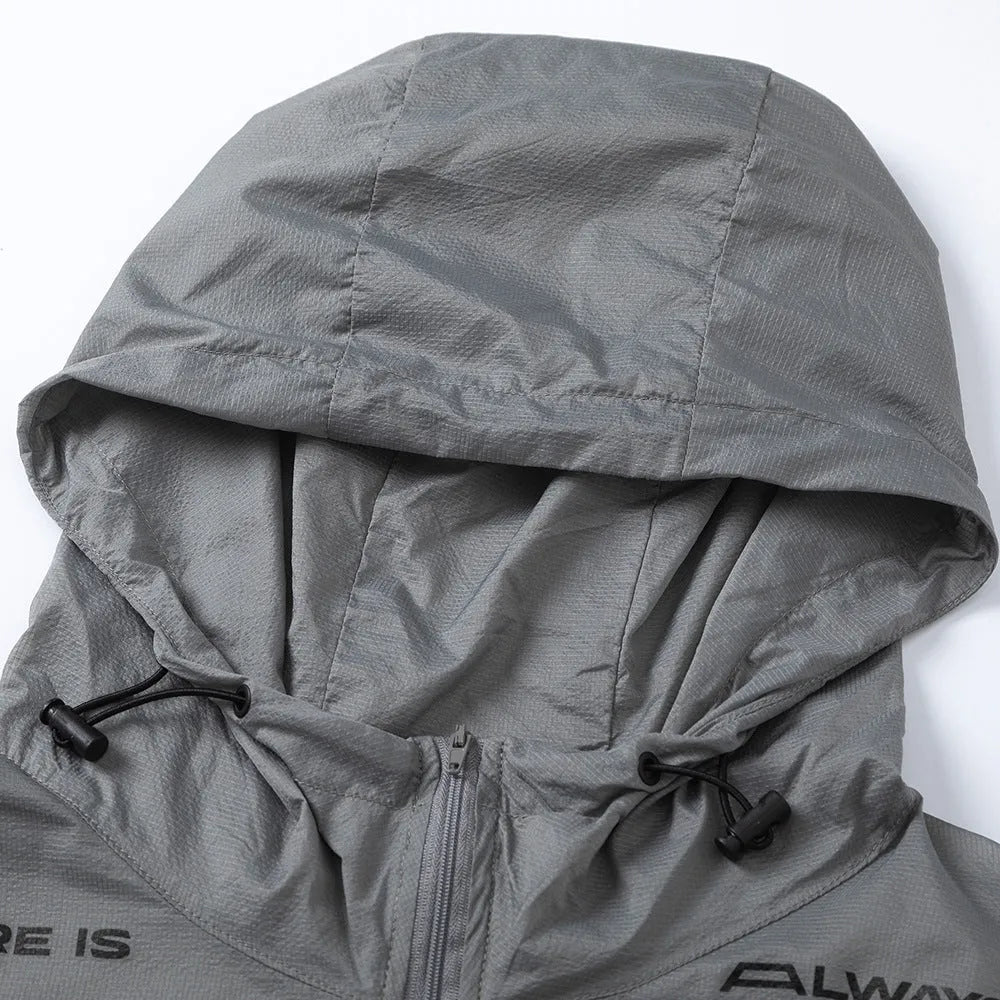 Men's lightweight nylon sun protection jacket with letter print, available in grey or black, sizes M to XXL