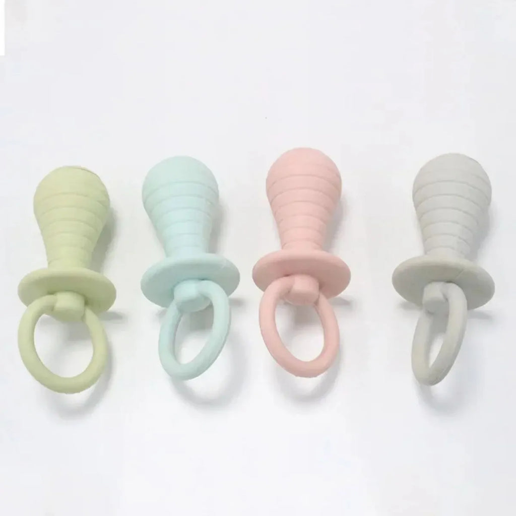 Set of four TPR rubber pet pacifier chew toys with squeakers in blue, gray, green and pink colours