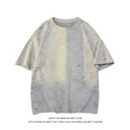 Men's grey cotton blend ripped short sleeve T-shirt in loose pullover style showing regular sleeves
