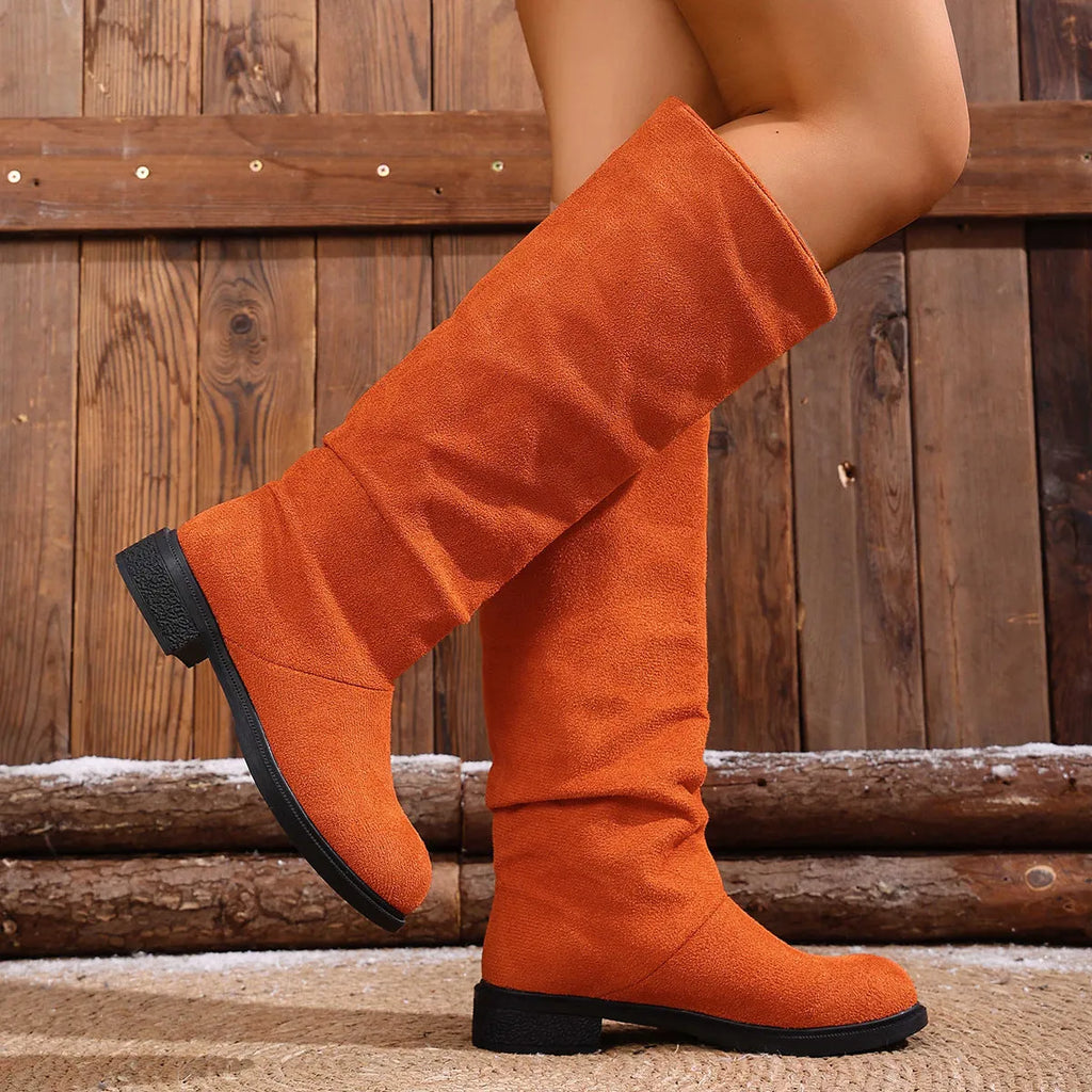 Cow suede chunky heel high leg boots below the knee in black solid colour with round toe and leather lining
