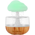 White cloud-shaped humidifier with essential oil diffuser and colour-changing night light.