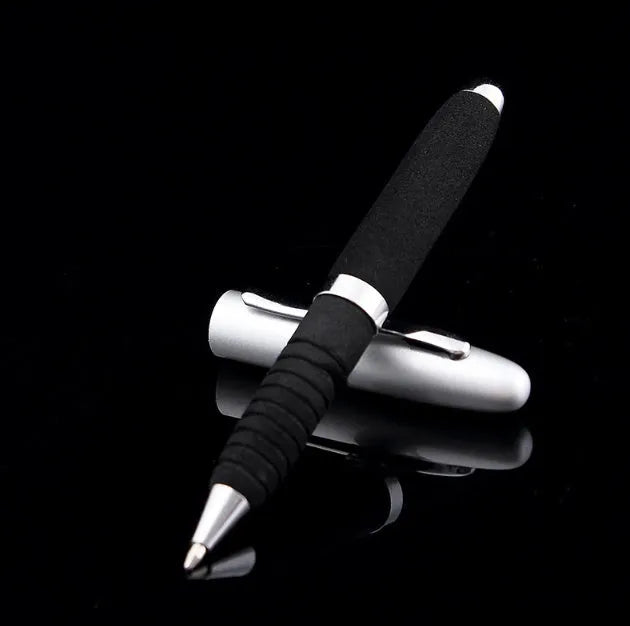 Compact silver metal ballpoint pen with black EVA-textured cap, shown with 1.0mm tip and assorted ink refills.