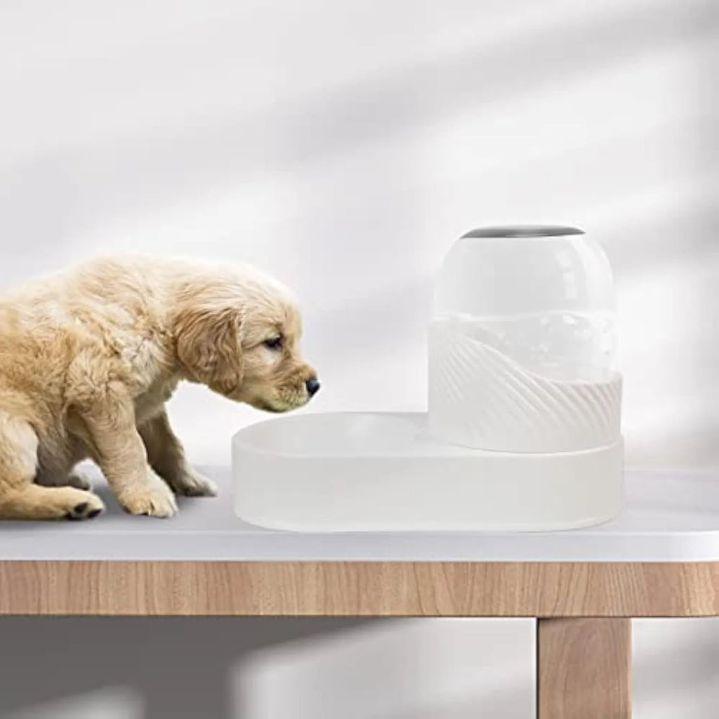 White automatic gravity cat feeder and water dispenser set with wave-patterned design.