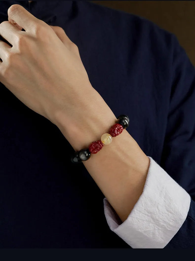 Carved cinnabar beads bracelet with Jinniu bull zodiac design in gold or silver finish