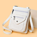 Vertical square crossbody phone bag in pu leather with sewing line detail and crossbody strap