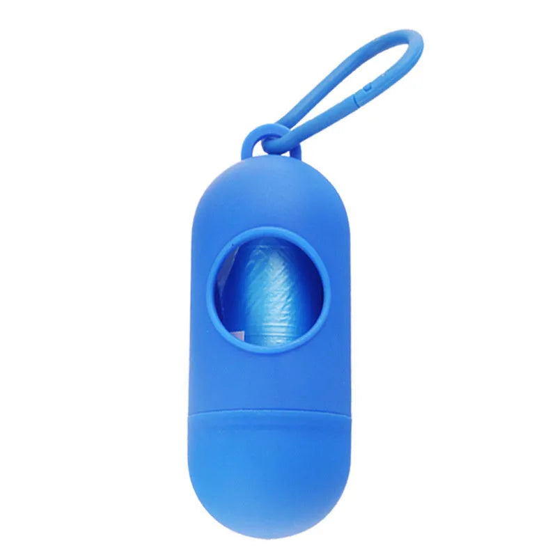 Black dog poop bag holder with side hook and Velcro closure, showing compact size.