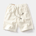 Men's khaki retro cargo shorts with straight-leg cut and cargo pockets for summer street wear