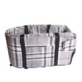 A grey cloth outdoor dog kennel set up in a garden, showing its open front and mesh panel.