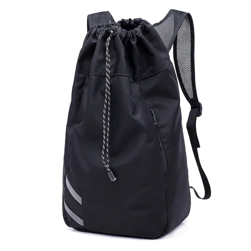 Black nylon backpack gym bag, 30 x 17 x 56cm, with zip pocket and three carry modes