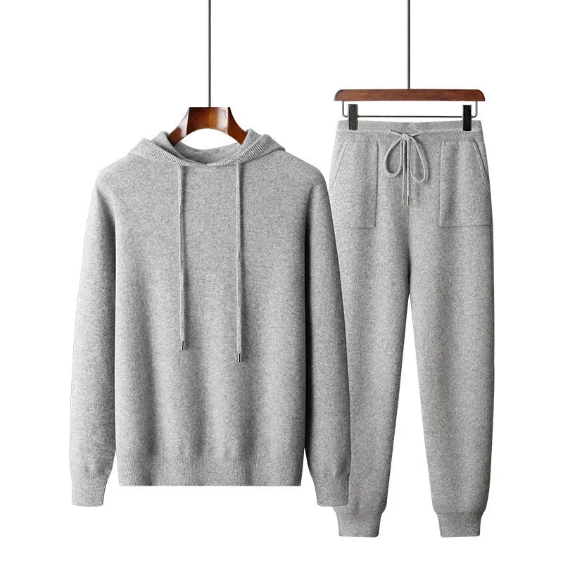 Men's light grey cashmere hoodie and matching trousers casual set laid flat.