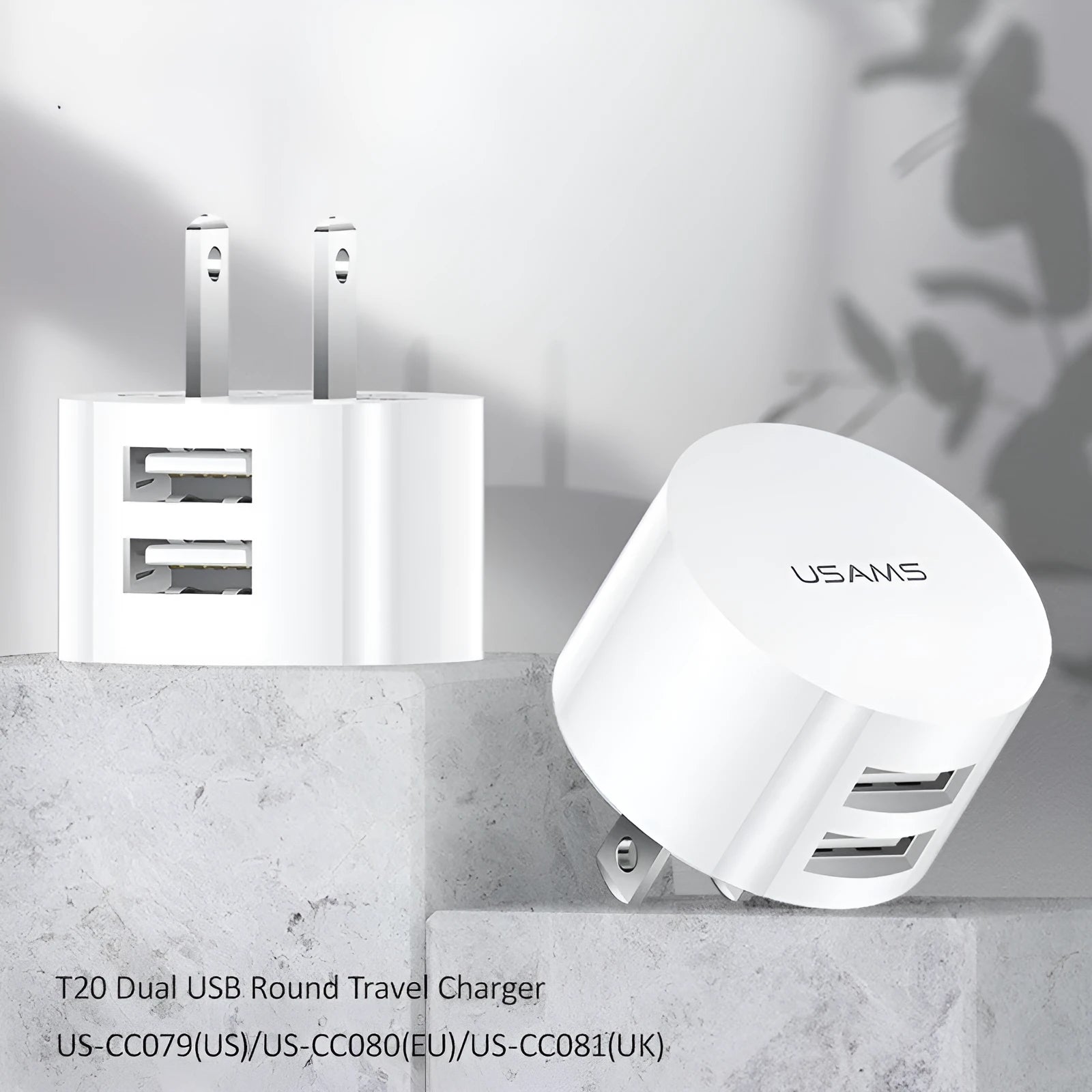 White portable universal dual USB phone charger with US, EU and UK plugs