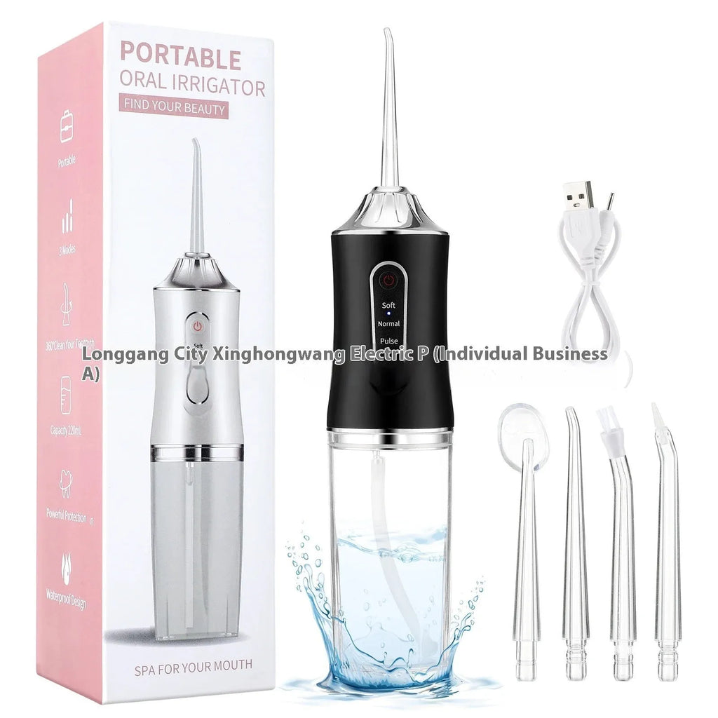 Pink portable electric water flosser with replaceable nozzles and large water tank on bathroom counter