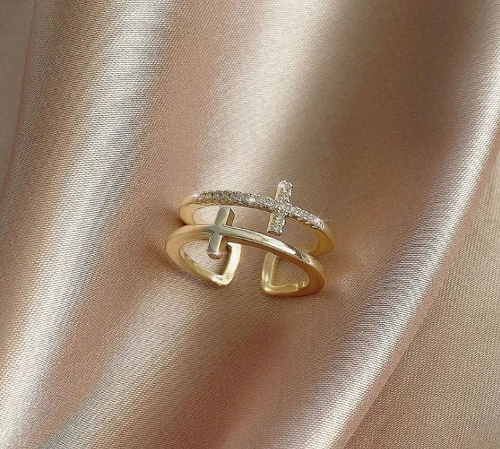 Geometric adjustable copper ring with a white gold finish and a central zircon stone in a sterling silver setting.