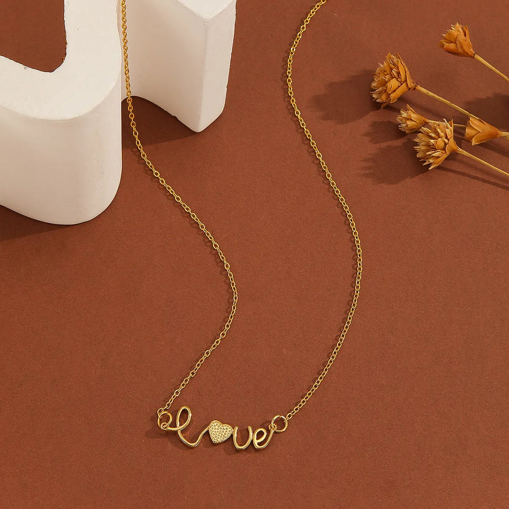 Gold plated copper infinity love pendant necklace with diamond accents and fine chain.