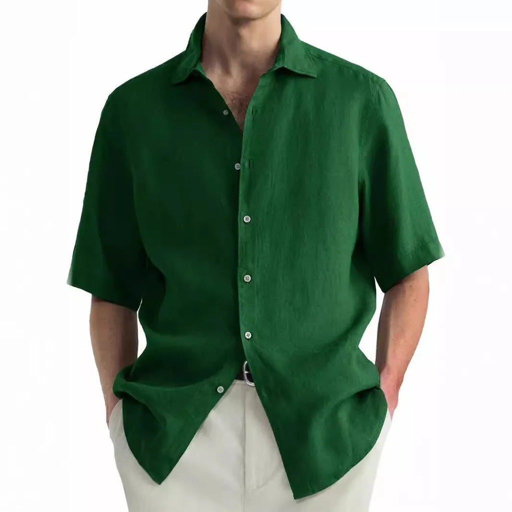 Men's green washed cotton casual cardigan shirt laid flat, showing regular fit and button front.