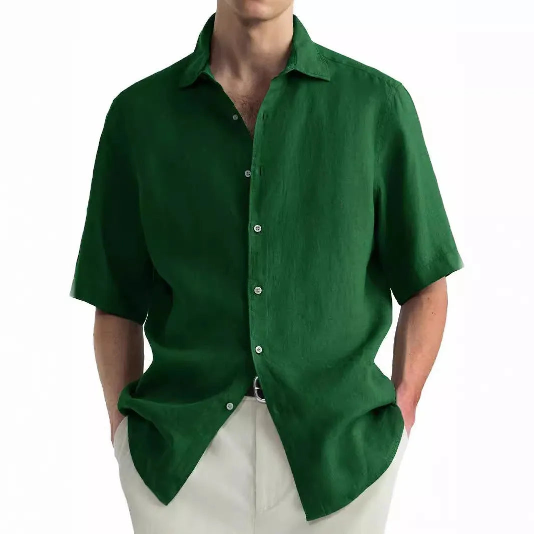 Men's green washed cotton casual cardigan shirt laid flat, showing regular fit and button front.