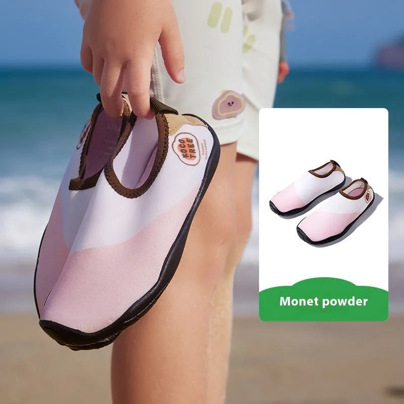 Children's beach shoes in bright colours with anti-slip rubber sole and textured upper.