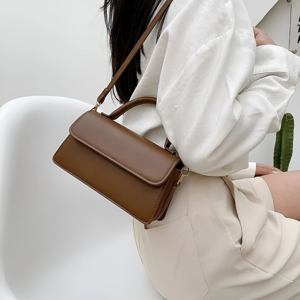 Retro textured solid colour PU shoulder bag in horizontal square shape with sewing thread detail
