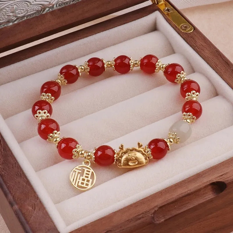 Women's floral glazed bracelet with zodiac animal charm in red, pink or white bead colours
