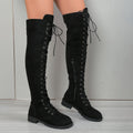 Black lace-up over-the-knee boots with a round toe, flat rubber sole, and decorative stitching on the shaft.