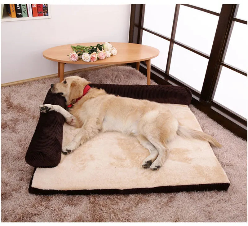 Corduroy bolster dog bed in grey colour, showing its non-slip base and high sides.
