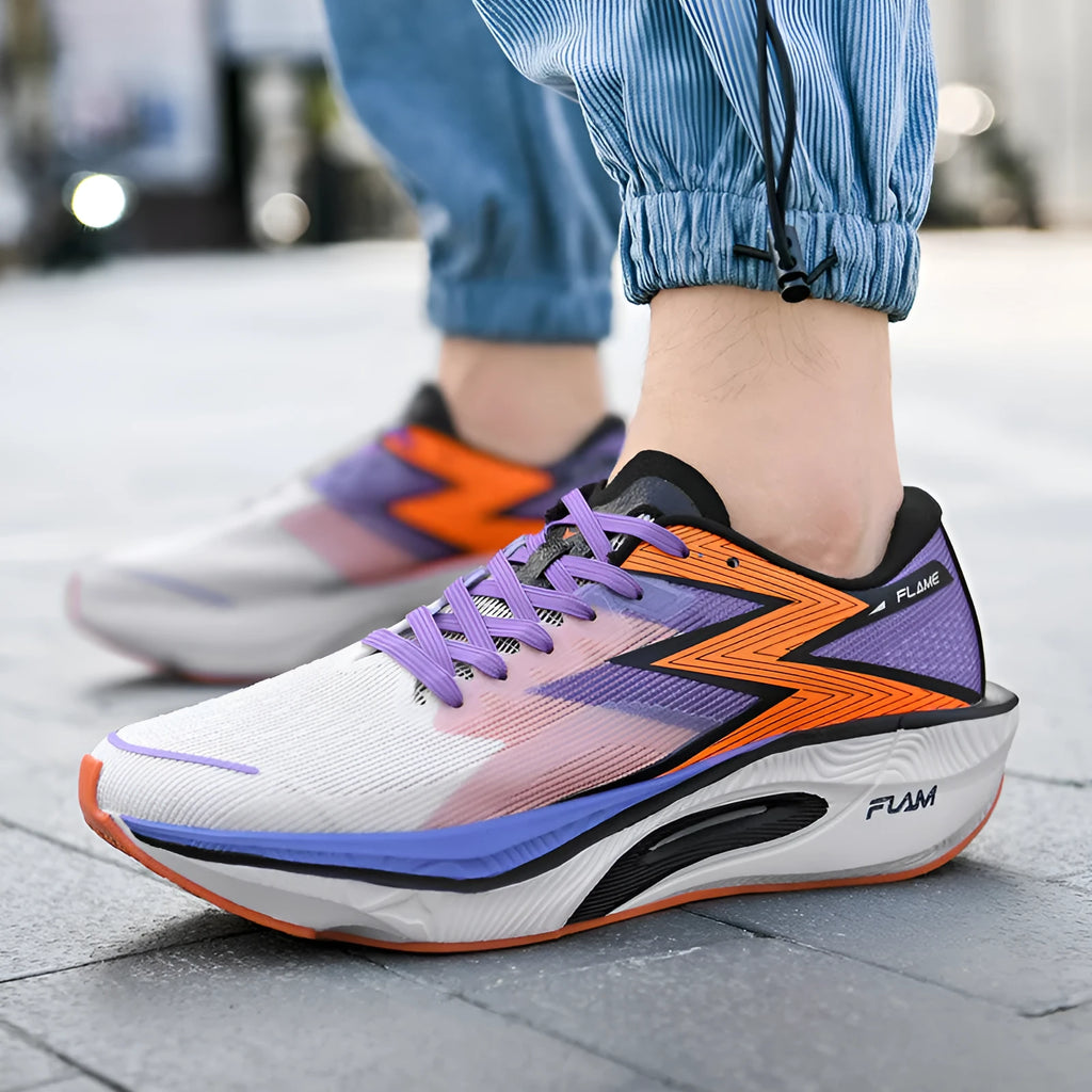 Marathon full palm carbon plate running shoes in orange, showing low-top fabric upper and round toe.