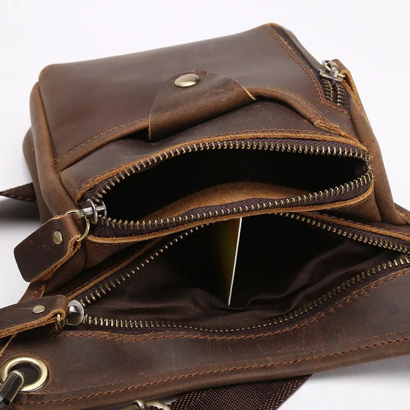 Men's brown crazy horse leather retro satchel bag with flap closure and adjustable shoulder strap.