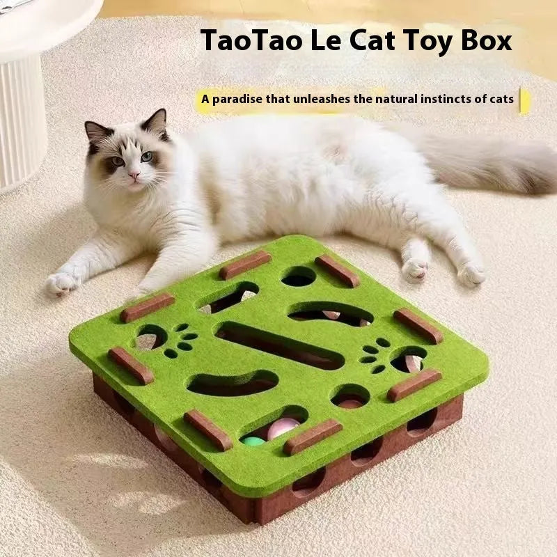Green brown handmade felt box cat toy with holes for hide-and-seek play.