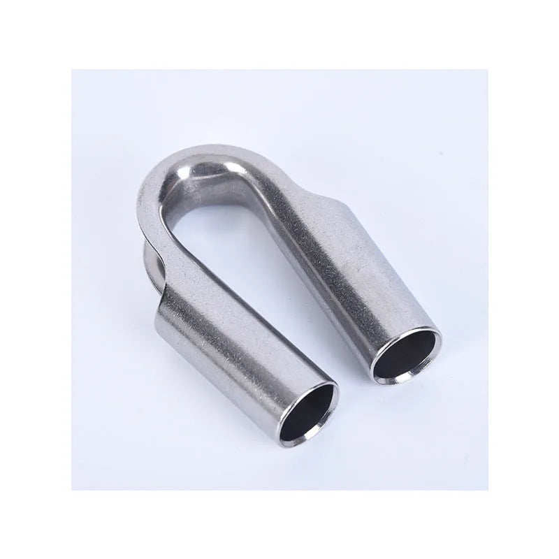 Stainless steel tubular chicken heart ring sleeve ring in round form on a white background.