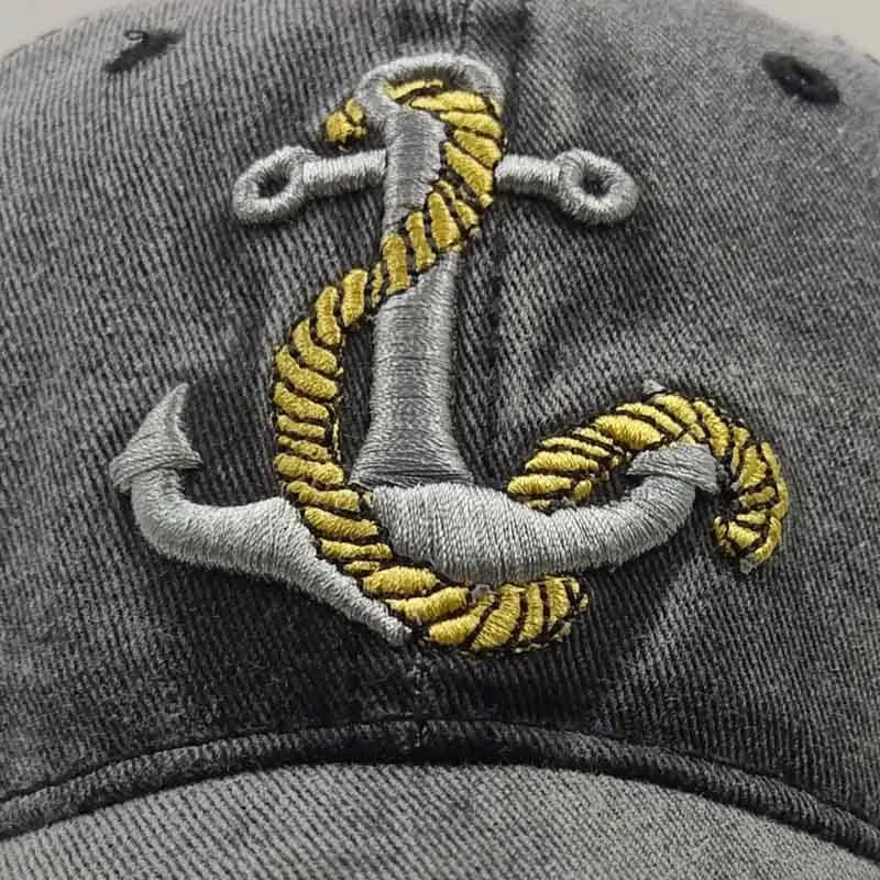 Anchor embroidered baseball cap in cotton, shown in red, khaki, black, and navy blue.