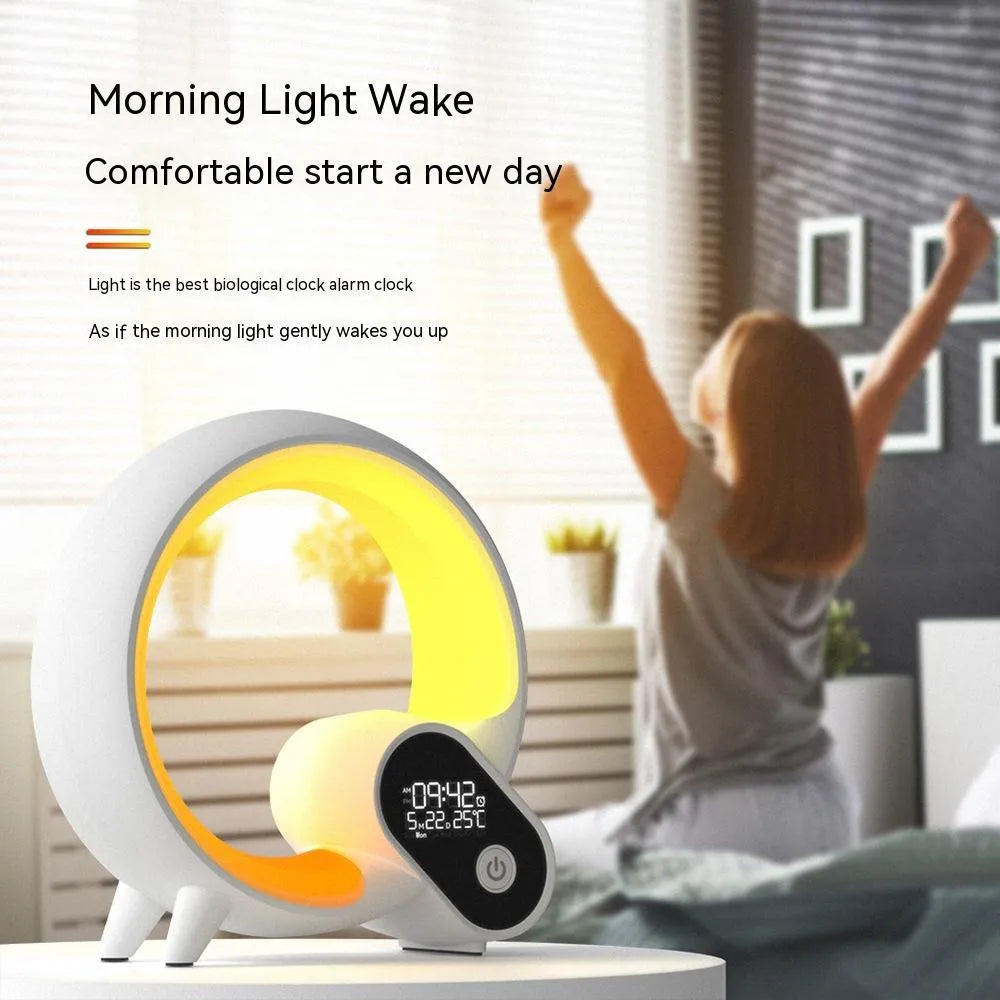 Creative Q modern digital alarm clock with colourful LED light ring in black or white finish.