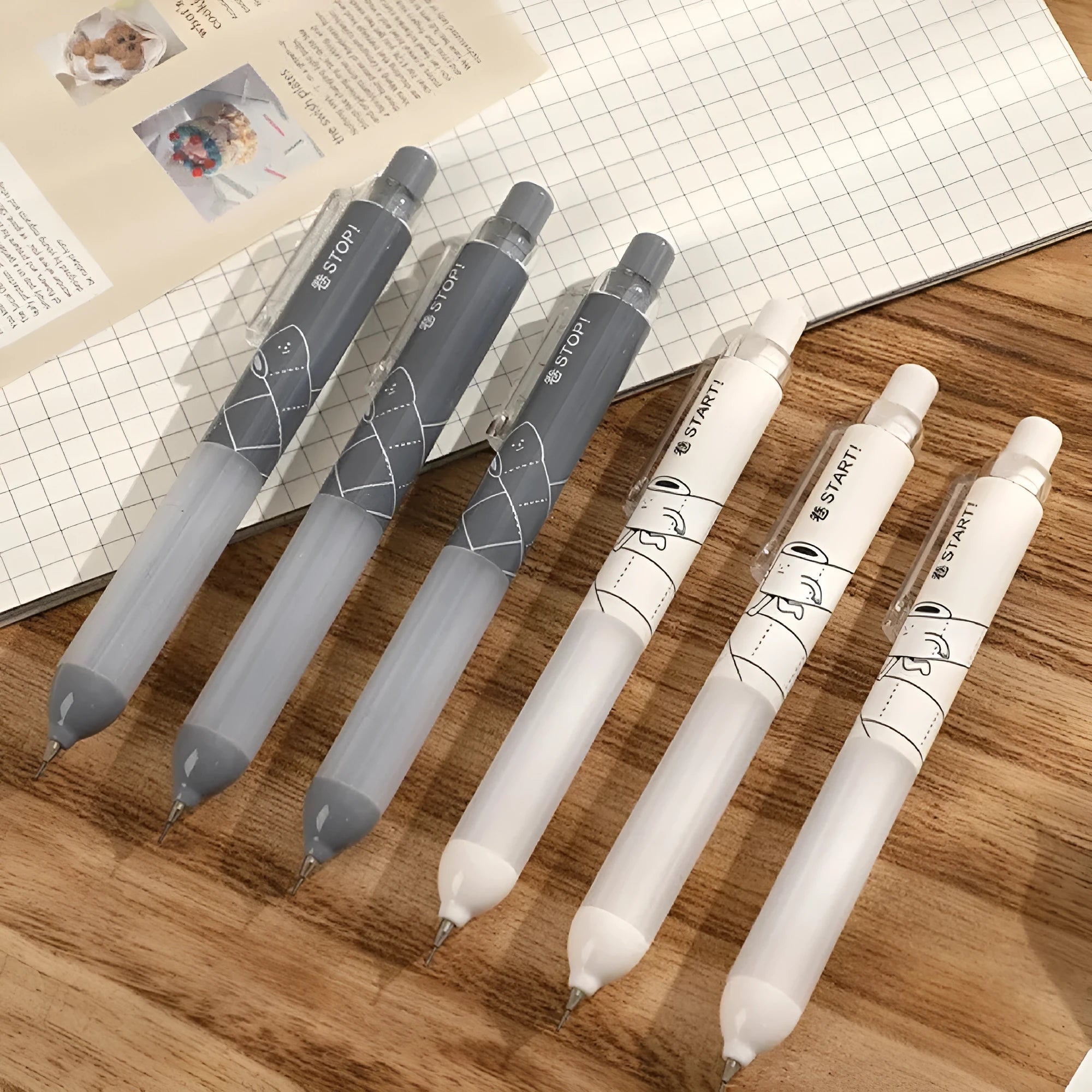 Black and white 0.5mm automatic pencil with a cloud grip, shown as a single unit and a two-piece set.