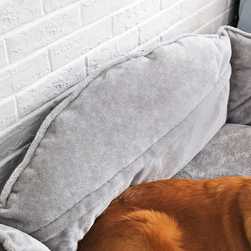 Grey polyester dog sofa bed with raised sides in XL size 120x90xH43cm on floor