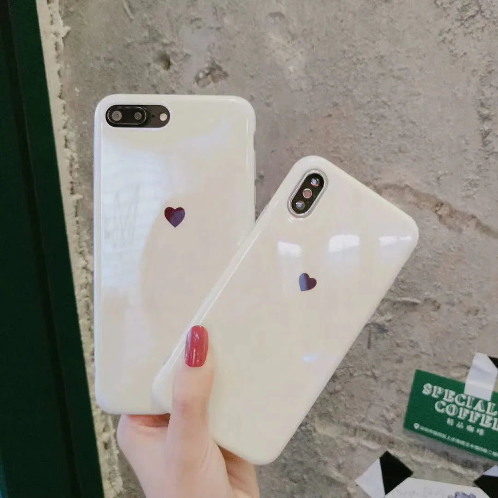 Transparent blue light blocking phone case for iPhone on a white background.