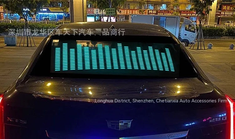 Long rectangular car interior rhythm light with electroluminescent panel showing a graphic design.