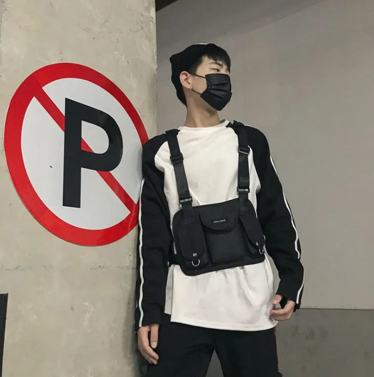 20-35L nylon casual sports backpack with zip pockets, double straps, and soft handle in Black, Camouflage, Gray, or Purple.