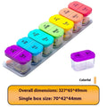 Extra large white and rainbow colour plastic pill organiser box with removable sections, shown with lid open.