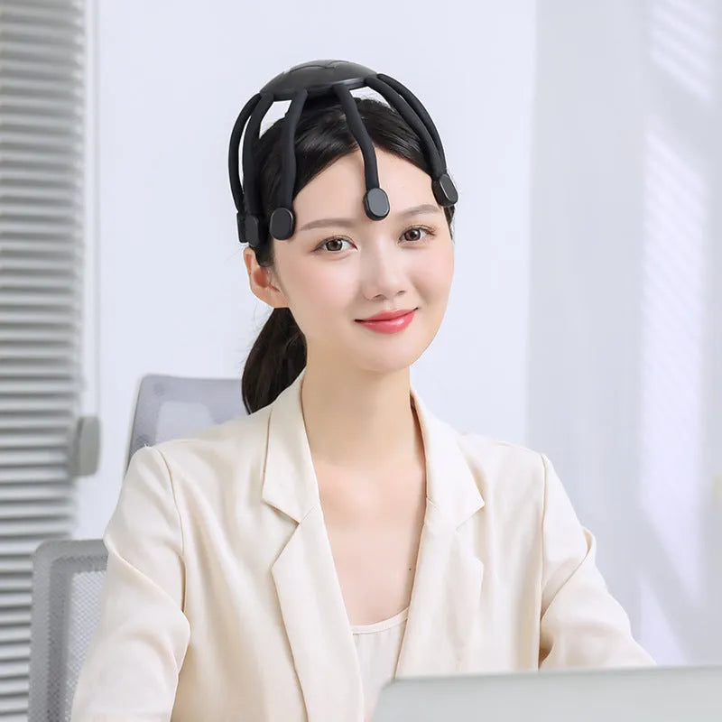 USB rechargeable head massager with multiple silicone vibrating claws in black colour