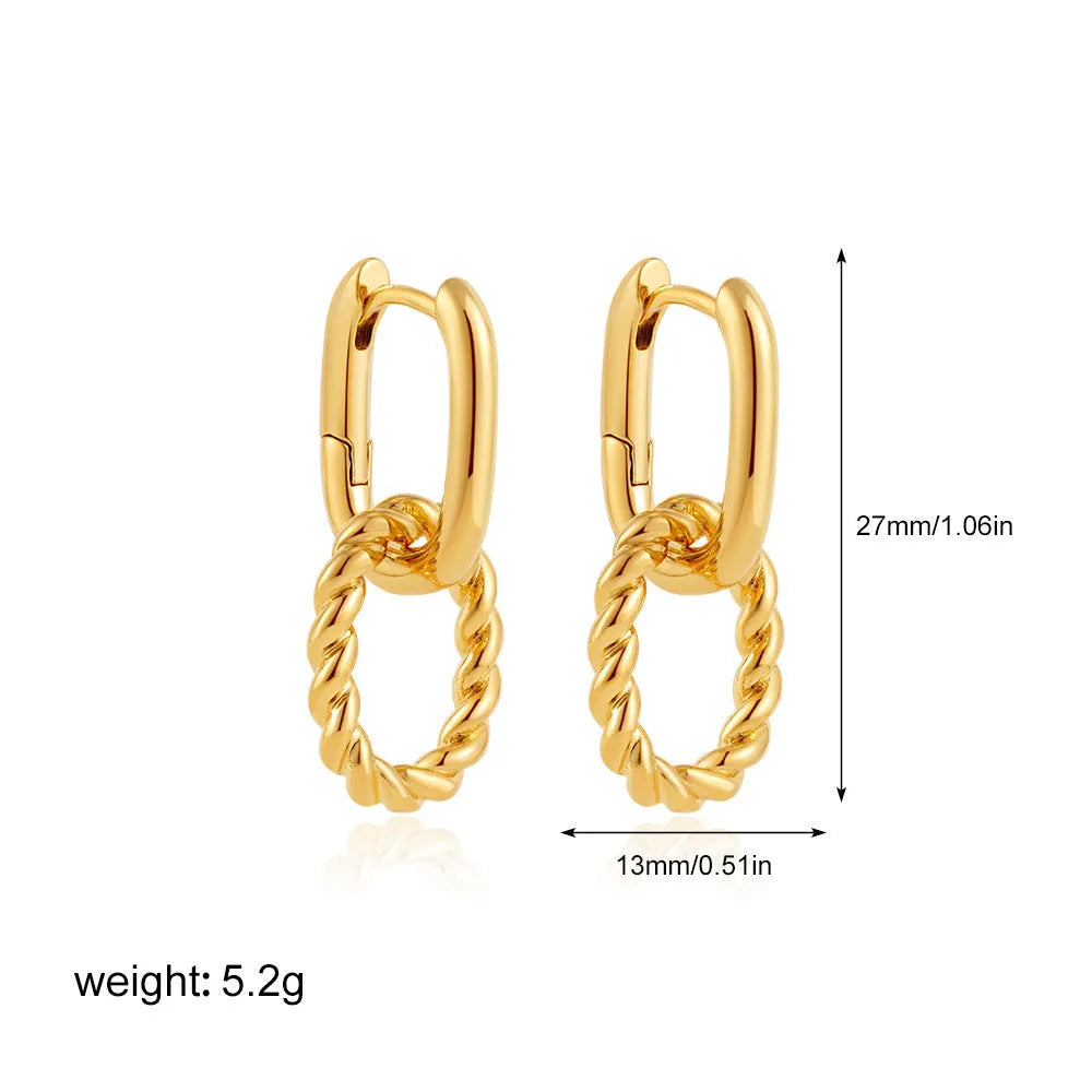 Double ring twist geometric square ear clip simple copper earrings on a neutral background