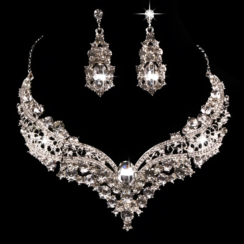 Alloy crystal rhinestone necklace and earring set with butterfly dragon serpent pattern on white background