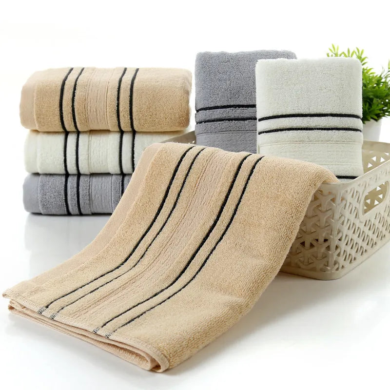 Pure cotton bath towel and hand towel set in neutral colours with yarn-dyed fabric construction