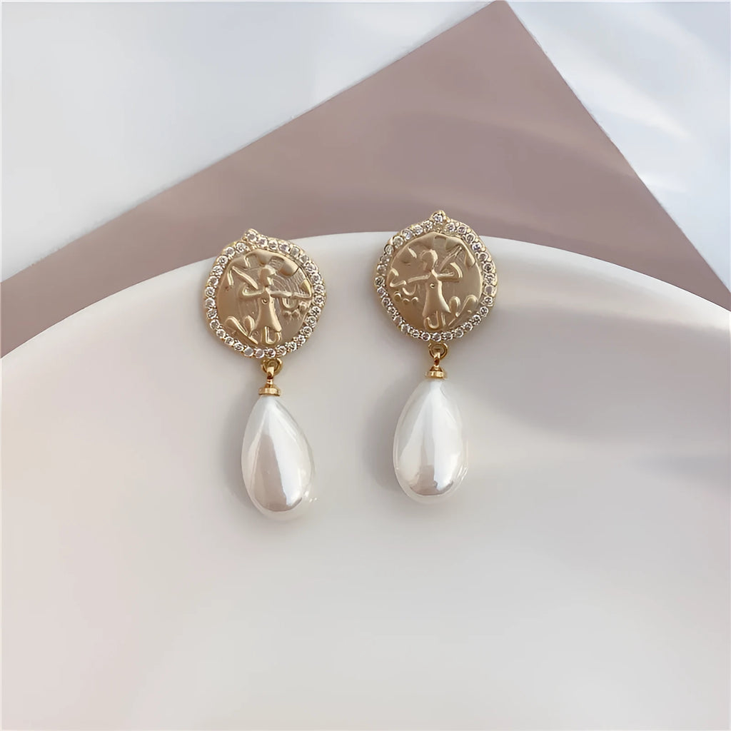 Water drop pearl earrings with micro inlaid zircon, copper geometry design and silver needle option