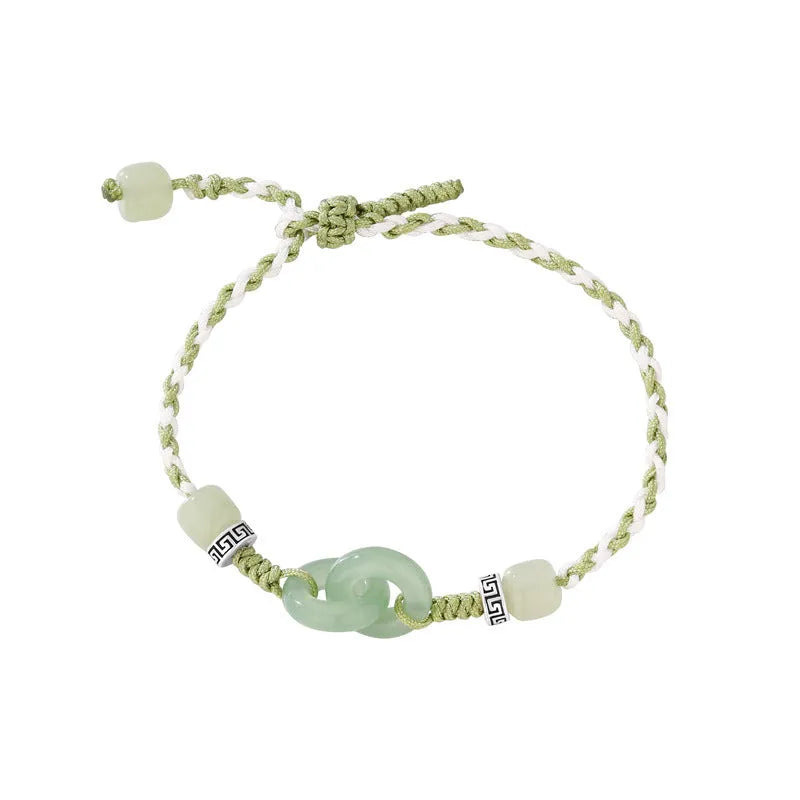 Women's green and copper ethnic-style bracelet with jade buckle weaving and a peace buckle charm.