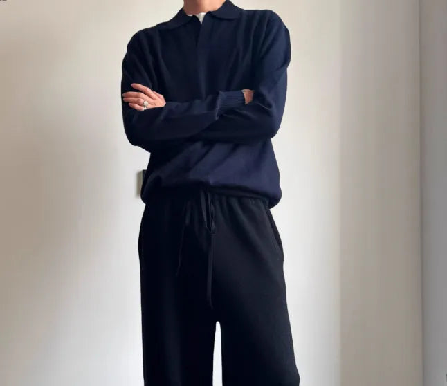 Man's pure wool polo sweater with lapel collar in loose fit, shown in milky white.