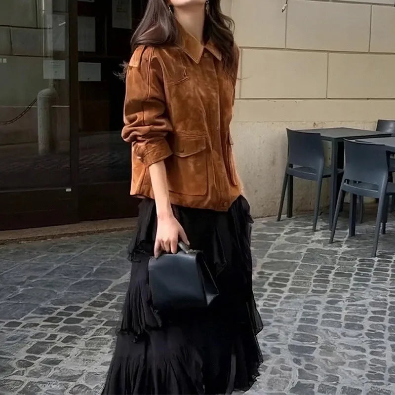 Women's brown suede-style street chic coat with regular sleeves on a hanger